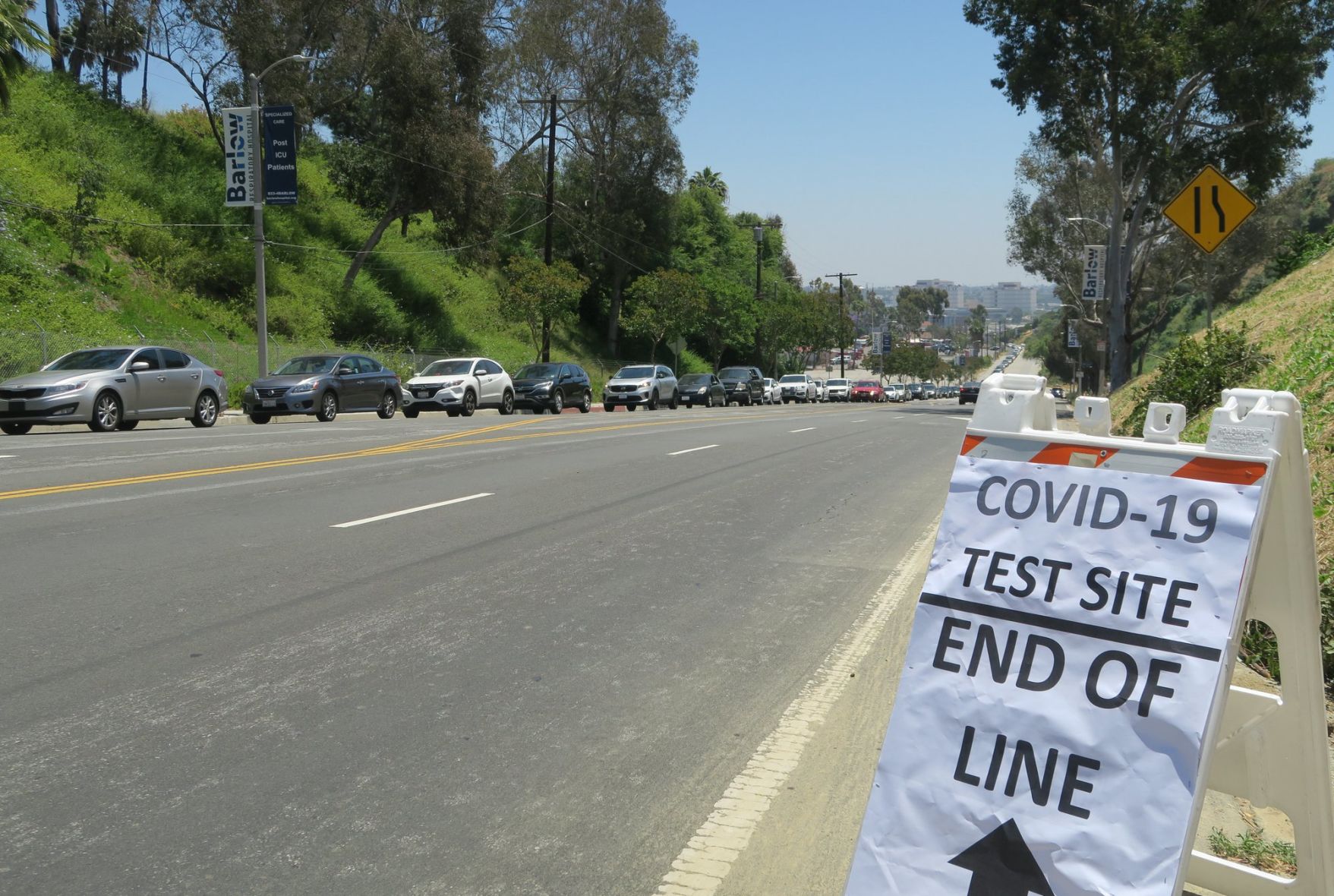 line of cars dodger stadium coronvirus testing site first day jesus sanchez 5-16-2020 1-10-059.JPG